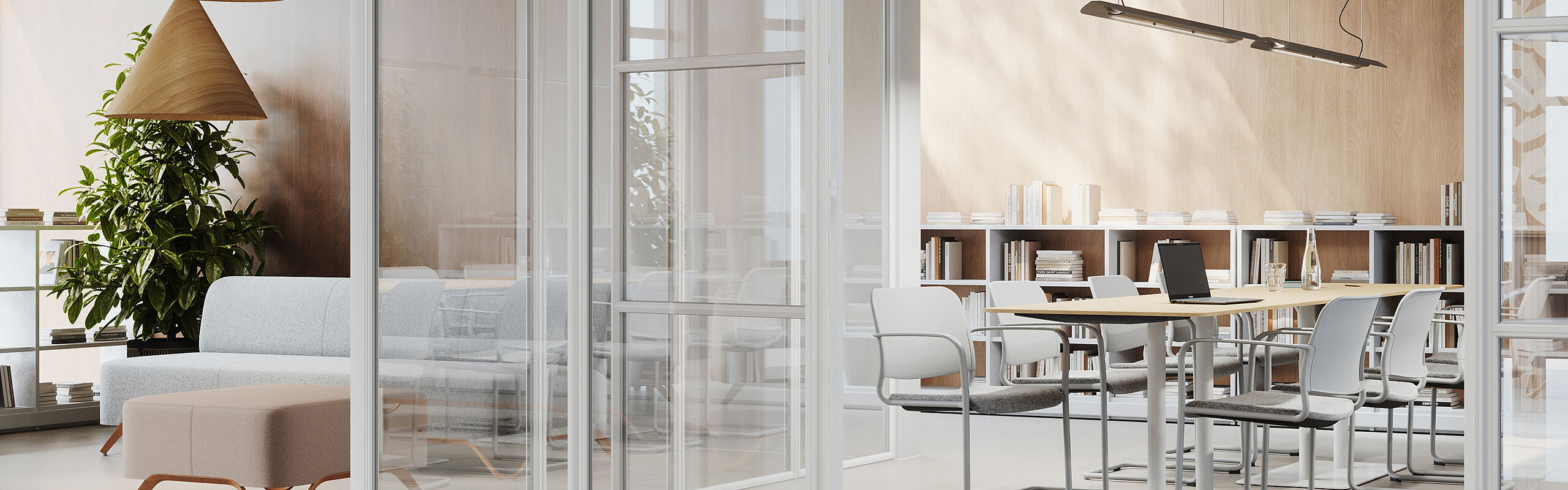 Bright, modern office space with a glass-enclosed meeting room, wooden elements, a table setting and an adjacent lounge area with sofa and plants.